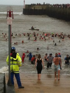 120 brave the chilly waters for the annual West Bay Boxing Day swim