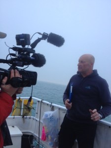 Mike being interviewed by the BBC as we have swam through the night and daylight appears